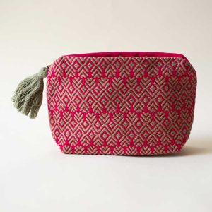 Volume cosmetic pouch made on a backstrap loom and hand-embroidered